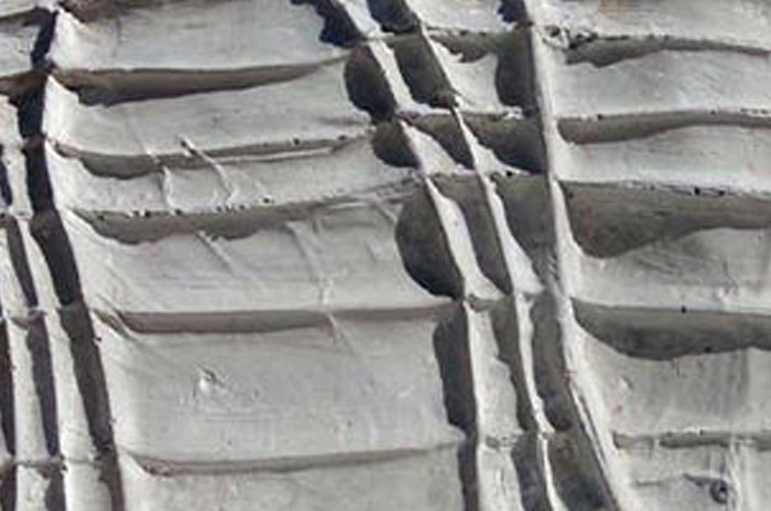 motifs in grey concrete closeup